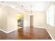 Bright dining area with hardwood floors, chandelier, and easy access to the kitchen at 6001 Condor Dr, Lakeland, FL 33809
