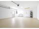Spacious garage featuring washer, dryer, and water heater at 6001 Condor Dr, Lakeland, FL 33809