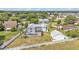 Aerial view of property with screened in pool, fenced yard and garage at 619 Somerset Loop, Auburndale, FL 33823