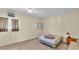 Cozy bedroom with carpet, ceiling fan and natural light at 619 Somerset Loop, Auburndale, FL 33823