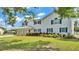 Home exterior with large front lawn during the day at 619 Somerset Loop, Auburndale, FL 33823