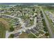 Aerial view of a residential community featuring neat streets and a community layout at 647 Chicago Way, Dundee, FL 33838