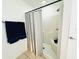Clean, well-maintained shower stall with a shower curtain, tiled walls and a convenient shower head at 709 N Polk Ave, Fort Meade, FL 33841