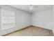 Bedroom features natural light, neutral walls and carpet flooring at 7337 Hunters Greene Cir, Lakeland, FL 33810