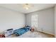 Bedroom offers a ceiling fan, natural light and ample space for furniture at 7337 Hunters Greene Cir, Lakeland, FL 33810