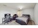 Comfortable bedroom with carpet, neutral walls, desk and bed illuminated by natural light, creating a serene atmosphere at 7337 Hunters Greene Cir, Lakeland, FL 33810