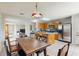 Eat in Kitchen with stainless steel appliances, center island, tile floors, and open access to the living spaces, lots of light at 7337 Hunters Greene Cir, Lakeland, FL 33810