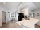 Kitchen with black appliances, bright breakfast nook, white cabinetry, and stylish countertops at 7642 Habersham Dr, Lakeland, FL 33810