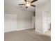 Bedroom featuring carpeted floor, white walls, and a ceiling fan at 828 Cypress Creek Run, St Cloud, FL 34771