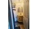 Charming bathroom features a chandelier, vintage vanity, and unique decor at 841 E Valencia St, Lakeland, FL 33805