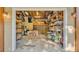 Spacious garage with ample storage, shelving, and room for multiple vehicles or hobbies at 841 E Valencia St, Lakeland, FL 33805
