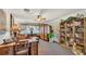 Well-appointed living room with classic furniture, a large bookshelf, and a peaceful ambiance at 841 E Valencia St, Lakeland, FL 33805