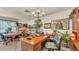 Bright office space with rich wood desk, vintage decor, and ample natural light at 841 E Valencia St, Lakeland, FL 33805
