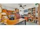 Large home office with custom built-in shelving, cabinetry, and plenty of natural light at 841 E Valencia St, Lakeland, FL 33805