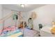 bedroom with fun decor, playroom and a large sunny window at 848 17Th Ne Ter, Winter Haven, FL 33881