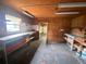 Spacious garage with shelving, workbenches, and storage space, perfect for DIY projects and organization at 8504 N Campbell Rd, Lakeland, FL 33810
