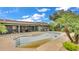 Large backyard featuring an in-ground pool that needs cleaning, complemented by lush landscaping at 8535 Plantation Ridge Blvd, Lakeland, FL 33809