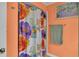 Bathroom with a floral shower curtain, a towel bar, and pastel walls at 8535 Plantation Ridge Blvd, Lakeland, FL 33809