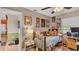 Cozy bedroom features a charming bed, complemented by whimsical artwork and natural light at 8535 Plantation Ridge Blvd, Lakeland, FL 33809