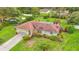 Charming single-story home with lush landscaping, a two-car garage, and a welcoming entrance at 8535 Plantation Ridge Blvd, Lakeland, FL 33809