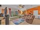 Cozy living area with a large window, comfortable seating, and vibrant décor, creating a warm and inviting space at 8535 Plantation Ridge Blvd, Lakeland, FL 33809