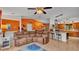 Spacious living room showcasing an open-concept design and tile floors, blending modern living with comfort at 8535 Plantation Ridge Blvd, Lakeland, FL 33809