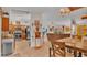 Open living space connecting the kitchen, dining, and living areas, perfect for entertaining at 8535 Plantation Ridge Blvd, Lakeland, FL 33809