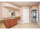A vanity and sink with granite counter tops in this spacious Primary bathroom at 943 Hamilton Place Ln, Lakeland, FL 33813