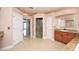 A luxurious bathroom with a glass enclosed shower, and a vanity with a sink at 943 Hamilton Place Ln, Lakeland, FL 33813
