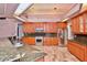 Gourmet kitchen with stainless steel appliances, granite countertops, and lots of cabinet space at 943 Hamilton Place Ln, Lakeland, FL 33813