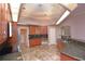 Spacious kitchen featuring stainless steel appliances, wooden cabinetry and tiled floor at 943 Hamilton Place Ln, Lakeland, FL 33813
