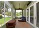 Relaxing enclosed lanai leading to backyard at 943 Hamilton Place Ln, Lakeland, FL 33813