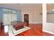 View of the open-concept living area with recessed lighting and hardwood floors, featuring an adjacent billiards room at 943 Hamilton Place Ln, Lakeland, FL 33813