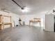 Large garage with a utility sink, storage and lots of open space at 1034 Shadowbrook N Dr, Lakeland, FL 33813