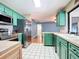 Well-appointed kitchen featuring stainless steel appliances and stylish tiled backsplash at 1034 Shadowbrook N Dr, Lakeland, FL 33813