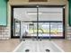 Kitchen sink featuring view of outdoor living space with screened in pool at 1034 Shadowbrook N Dr, Lakeland, FL 33813