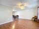 Large living room features hardwood flooring and comfortable dining area at 1034 Shadowbrook N Dr, Lakeland, FL 33813