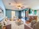 Inviting living room featuring hardwood floors and easy access to kitchen at 1034 Shadowbrook N Dr, Lakeland, FL 33813