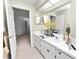 Elegant bathroom vanity with double sinks and decorative accents at 1117 Stonebrooke Ln # 58, Lakeland, FL 33803