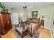 Ornately decorated bedroom with ceiling fan, wardrobe, and ensuite bath access at 1117 Stonebrooke Ln # 58, Lakeland, FL 33803