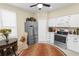 Spacious kitchen features stainless steel appliances and ample counter space and a ceiling fan at 1117 Stonebrooke Ln # 58, Lakeland, FL 33803