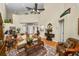 Expansive living area with soaring ceilings, hardwood floors, and elegant furnishings at 1117 Stonebrooke Ln # 58, Lakeland, FL 33803