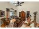 Bright living room with a sliding glass door, stylish furniture, and unique decorative items at 1117 Stonebrooke Ln # 58, Lakeland, FL 33803