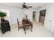 Office with ceiling fan, shutters, doorway, and ornate desk at 1117 Stonebrooke Ln # 58, Lakeland, FL 33803