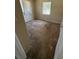 This bedroom features a window and carpet flooring at 1120 Ivy Ln, Bartow, FL 33830