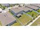 Aerial view of a home with a screened patio and fenced backyard in a well-maintained neighborhood at 1125 Mattie Pointe Blvd, Auburndale, FL 33823