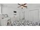 Bedroom with fan, dresser, closet, and carpet at 1125 Mattie Pointe Blvd, Auburndale, FL 33823