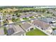 An aerial view of a residential neighborhood, highlighting the layout and surrounding greenery at 1129 Bowline St, Winter Haven, FL 33880