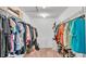 Organized walk-in closet with metal shelving and rods, offering ample storage for clothing and accessories at 1129 Bowline St, Winter Haven, FL 33880