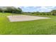 Sandy volleyball court with net, perfect for outdoor games and recreation at 13852 Eylewood Dr, Winter Garden, FL 34787